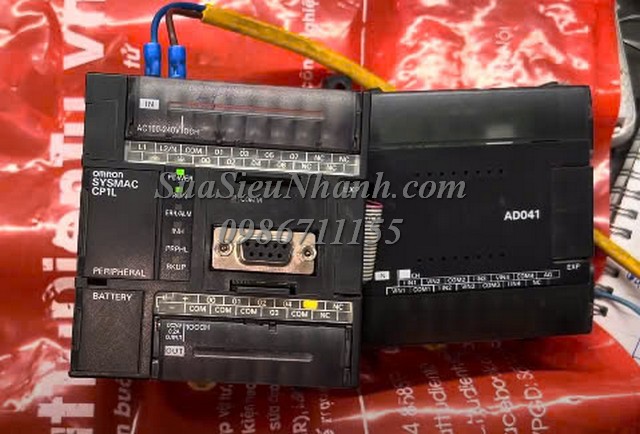 Sửa PLC OMRON SYMSMAC CP1L CP1L-L14DR-A 215S Lỗi nguồn chập chờn Sửa chữa PLC OMRON SYMSMAC CP1L Model: CP1L-L14DR-A Serial: 215S Lỗi nguồn chập chờn Phụ kiện kèm theo: PLC OMRON Model: CP1W-AD041 Serial: 115S